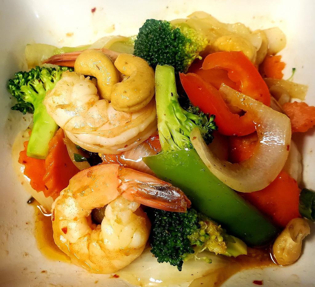 42. Cashew Stir Fry · Choice of meat stir fried with bell pepper, onion, broccoli and cashews topped with homemade sauce.