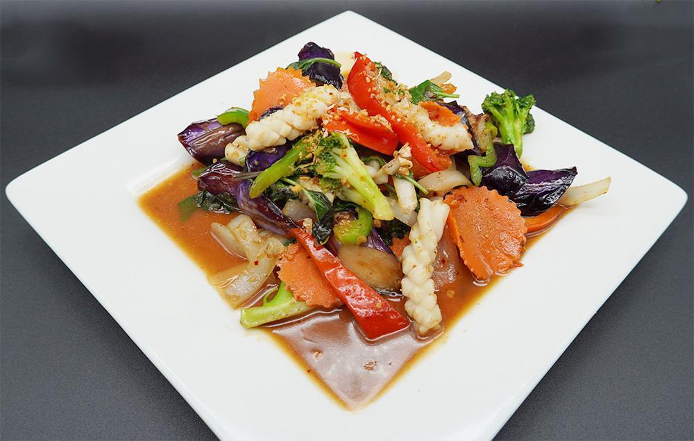 43. Sweet Eggplant Stir Fry · Your choice of meat stir fried with eggplant, bell pepper, onion, celery, sweet basil and our signature sauce. Spicy.