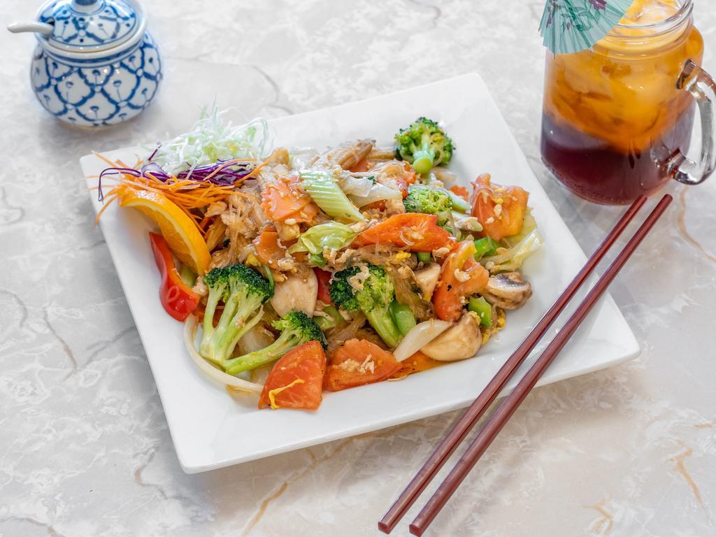 49. Pad Woon Sen · Glass noodles stir fried with egg, cabbage, baby corn, snow peas, tomatoes, mushrooms, onions, celery and bell peppers.