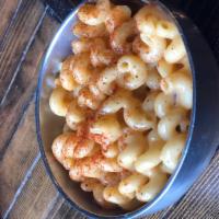 Mac and Cheese · A cup of house made creamy cheddar cheese and noodles. Vegetarian.