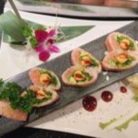 Sweet Heart Roll · Kani Tempura,Spicy Tuna,Avocado and Seaweed Salad with Pink Soy Paper Sheet in Heart Shape