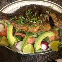 Mojarra Frita · Fried porgy. served with salad, tortillas, rice, and beans.