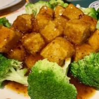 General Tso's Tofu · Lightly breaded tofu with garlic and sweet spicy sauce. Hot and spicy.