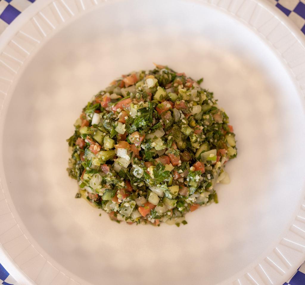 Tabouli Salad · Parsley, cracked bulgur wheat, tomato, onion, and cucumber tossed with olive oil and lemon vinaigrette.