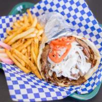 Gyros Pita Sandwich · Fresh broiled lamb and beef mixture, tomato, and onion served on fresh grilled pita with tza...