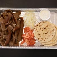 DIY Gyro kit · 1.5 pounds of gyro meat, 4 fresh grilled pitas, onions and tomatoes and a 6 oz tzatziki sauc...