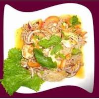 23. Crystal Noodle Salad · Clear noodles combined with grond pork, prawns, lime juice, chili, onions, tomatoes adn mint...