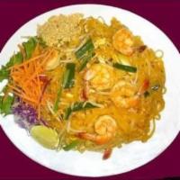 45. Pad Thai · Stir-fried thin rice noodles in tamarind sauce with egg, green onions and bean sprouts, crus...