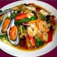 61. Spicy Seafood Basil · Stir-fried green mussel, calamari, shrimp, imitation carab, carrot, onion and garlic bell pe...