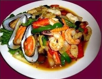 61. Spicy Seafood Basil · Stir-fried green mussel, calamari, shrimp, imitation carab, carrot, onion and garlic bell pepper, mushroom and basil leaves.