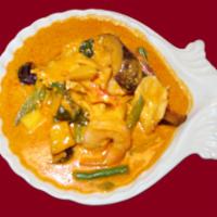 65. Mango Shrimp and ChickenCurry · Red chili paste in coconut milk, shrimp and chicken, fresh mango, green bean, bell pepper, e...