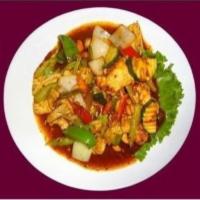 32. Cashew Nuts · Stir fried fresh Thai chili, Thai chili paste with garlic onion, carrot, celery, zucchini, g...