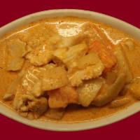 41. Yellow Curry · Yellow chili paste in coconut milk cooked with potatoes, carrots and onions. Spicy.