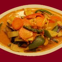 44. Jungles Curry · Coconut milk, bamboo shoots, mushrooms, green beans, carrots, bell peppers, eggplant and bas...