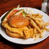Fried Grouper Sandwich · Served on a toasted bun with lettuce, tomato, coleslaw, pickle, and tartar sauce.