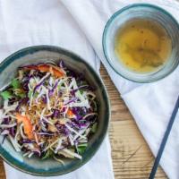 Vietnamese Crunchy Cabbage Salad · Refreshing cabbage slaw w/ red onions, bell pepper, mint & cilantro, topped w/ crushed peanu...