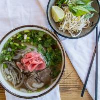 Beef Pho · Rice noodles in a savory beef broth with tender slices of rare eye round steak, brisket & fl...