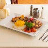 Bakhtiari · 2  Skewers of Combo of tender beef and spicy chicken thigh, onion, and sweet pepper. Served ...