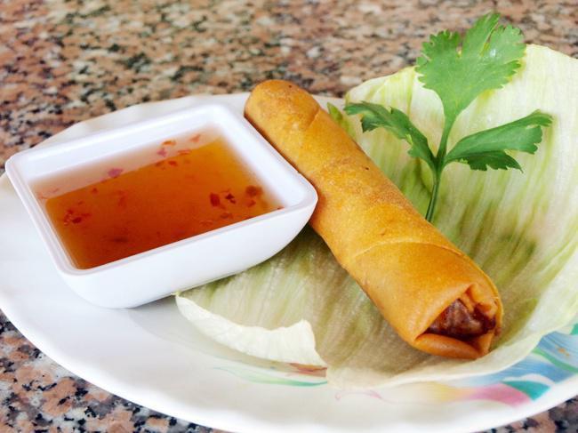 Fried Egg Roll · (1) Fried egg roll with pork, mushroom, carrots, glass noodles, wrapped & fried crispy. Served with fish sauce.