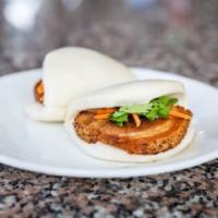 Thaison’s Steamed Buns · (2) Steamed rice buns with pickled carrot, scallion, cilantro and Thaison hoisin sauce.  You...