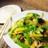 Buddha Delight · Tofu stir fried with white onion, broccoli, snow peas, mushrooms, bamboo shoots, and carrots...