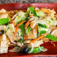 Vegan Pan Fried Noodles · Tofu wok tossed with white onion, broccoli, snow peas, mushroom, bamboo shoots and carrots i...