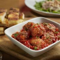 Piola’s Meatballs · Homemade beef and pork meatballs slow cooked in San Marzano tomato sauce. Served with focacc...