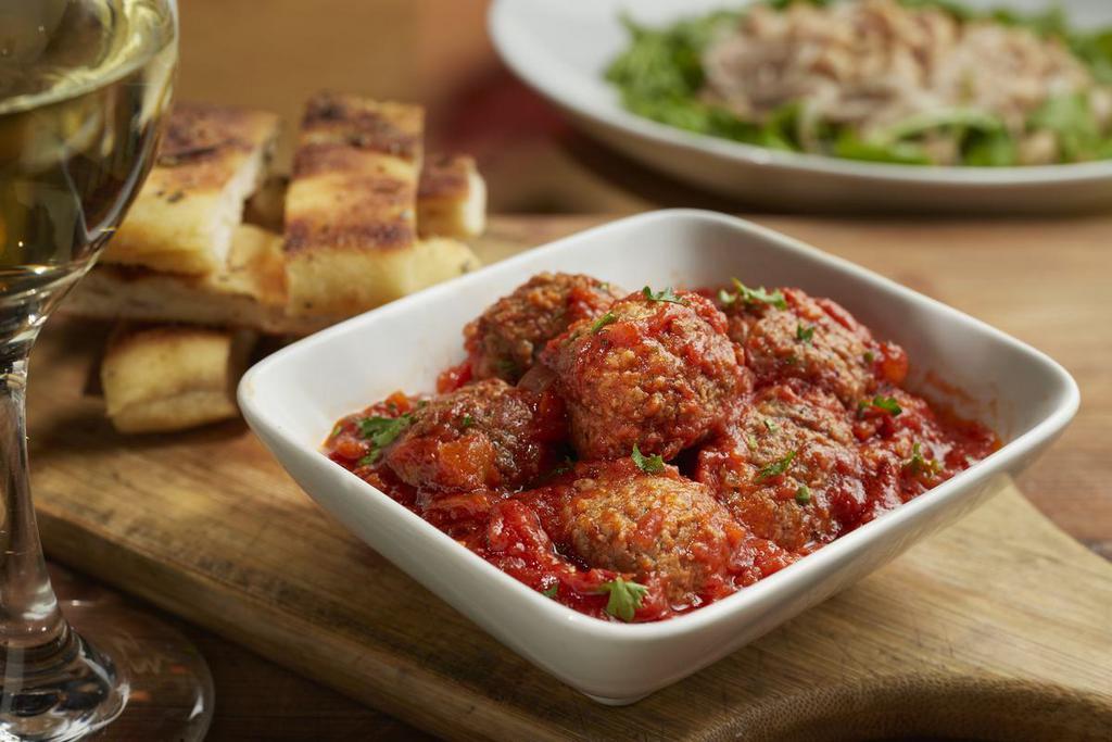 Piola’s Meatballs · Homemade beef and pork meatballs slow cooked in San Marzano tomato sauce. Served with focaccia stick.