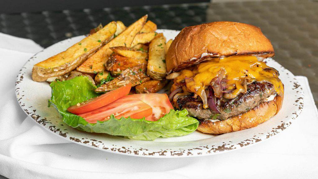 Alfredo's Burger Special · 1/2 Lb. Ground sirloin, lettuce, tomatoes, onions and mayo on a brioche bun. Grilled Mushrooms, Grilled Onions, Cheddar Cheese. Served with your choice of Garlic Fries or Salad. 