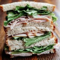 Berry Good For You Sandwich · Turkey and lettuce with raspberry mayo on Wheatberry bread. Served with seasoned kettle chip...
