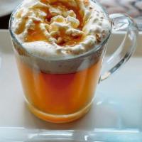 Caramel Apple Cider · Spiced apple cider and caramel, topped with whipped cream.