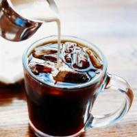 Cold Pressed Coffee · Cold brewed coffee over ice.