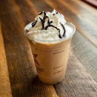 Iced Mocha · Chilled espresso, white and dark ghirardelli chocolate and milk over, topped with whipped cr...