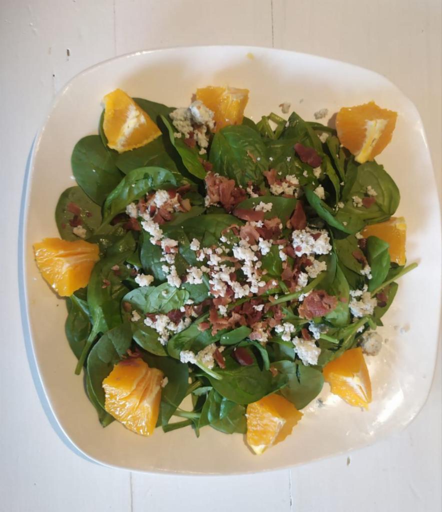 Spinach Salad · Spinach, gorgonzola cheese, bacon, orange, dried cranberries and citrus dressing.