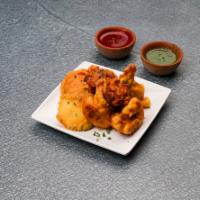 3. Vegetable Pakora · A deep fried mixed vegetable fritters.
