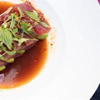 Tuna Tiradito · Yellowfin tuna, soy, sesame salsa macha, avocado, cilantro-Thai basil.