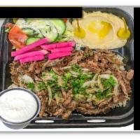 Beef Shawarma Plate · Marinated USDA choice beef served with your choice of French fries or rice, salad, hummus, g...