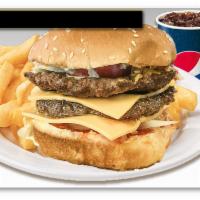 Double Cheese Burger Combo · Double beef patty, double cheese, ketchup, mustard.
French fries, and soft drink