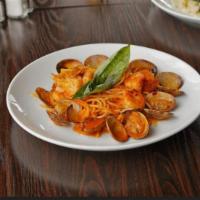 Seafood Pasta · Spaghetti, manila clams, mussels, shrimp, parsley, roasted garlic, and spicy marinara.