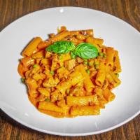 Boscaiola · Rigatoni pasta, Italian sausage, mushroom, peas, and pink sauce.