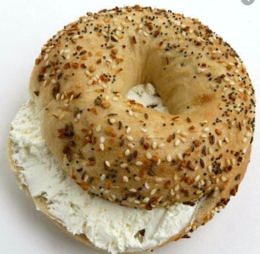 Toasted Bagel with Cream Cheese · Boiled and baked round bread roll. Soft mild cheese.