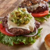 Holy Guacamole Burger · Pepper Jack cheese, guacamole, lettuce, tomatoes and red onions.