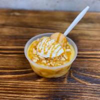 Salted Caramel Banana Pudding · Banana Pudding Drizzled with Caramel glaze topped with Crunchy Vanilla Wafers.