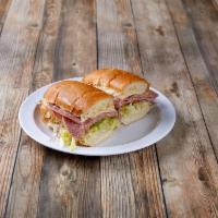 Italian Torpedo Sandwich · Genoa salami, mortadella, provolone cheese, lettuce, tomato, onion,  mayo and topped with It...