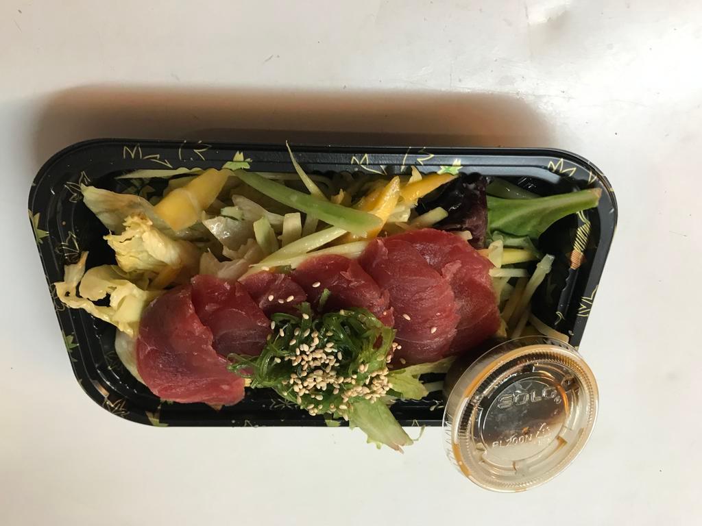 Tuna Tataki · Thinly sliced tuna served with ponzu sauce.