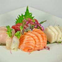 Sashimi Deluxe · 18 pieces of assorted sashimi  Served with a side.