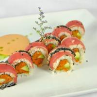 Sesame Crusted Tuna Roll · Spicy tuna and avocado topped with seared sesame tuna, served with spicy mayo and eel sauce.