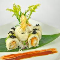 Queen's Roll · Lobster, shrimp tempura and spicy tuna topped with white tuna, avocado, caviar served with s...