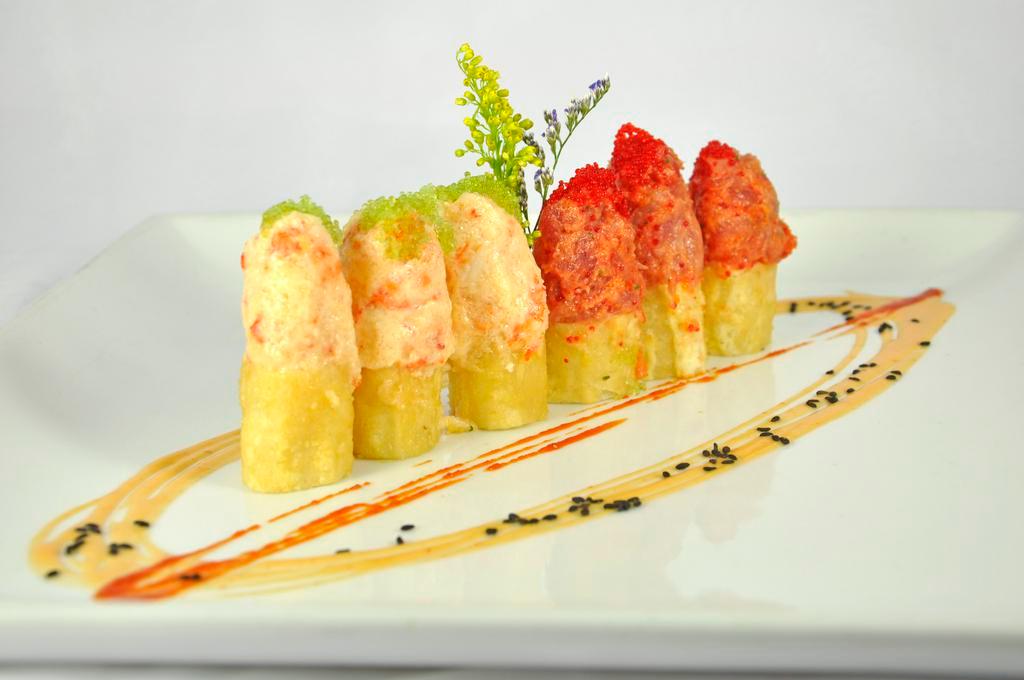 Crispy Spicy Tuna Roll · Crispy sweet rice spring roll topped with spicy tuna, served with spicy mayo sauce.