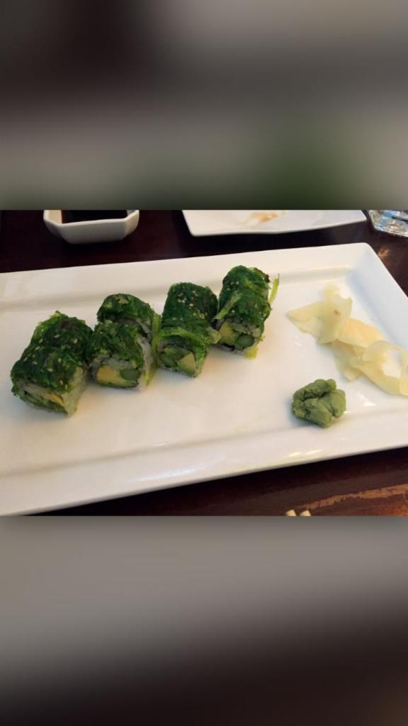 Green roll · Avocado asparagus cucumber inside,top with seaweed salad